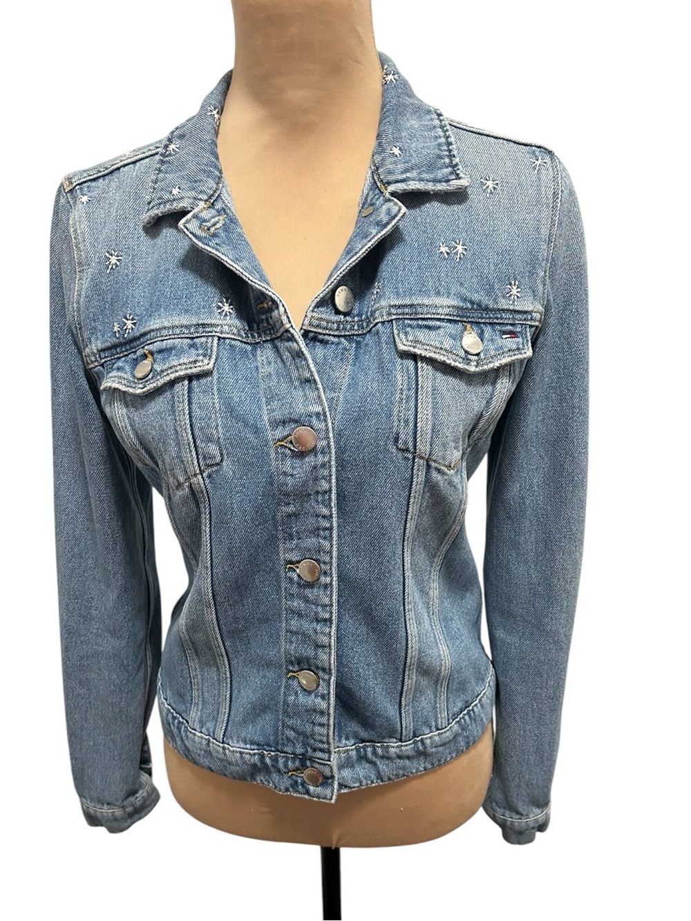 Tommy Hilfiger star-embroidered denim jacket, a classic mid-wash button-up piece